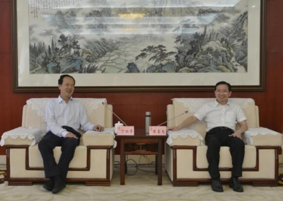 丁焰章拜會南昌市委副書記、市長黃喜忠